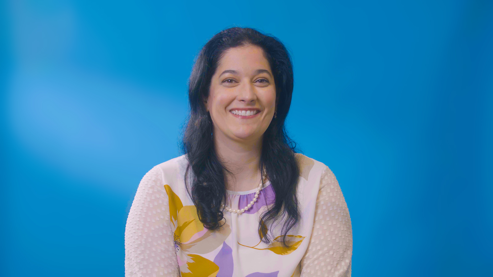 a woman smiling at camera
