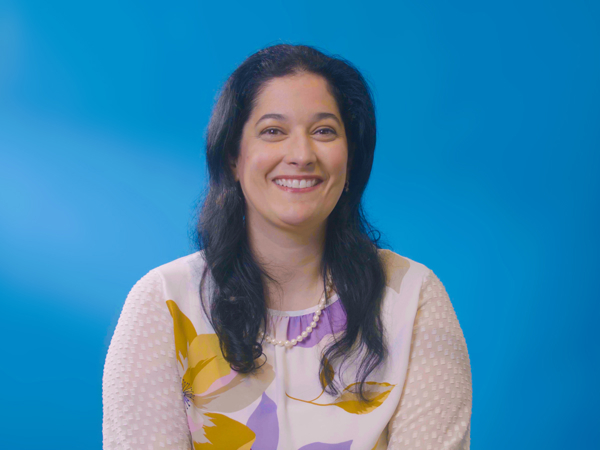 a woman smiling at camera