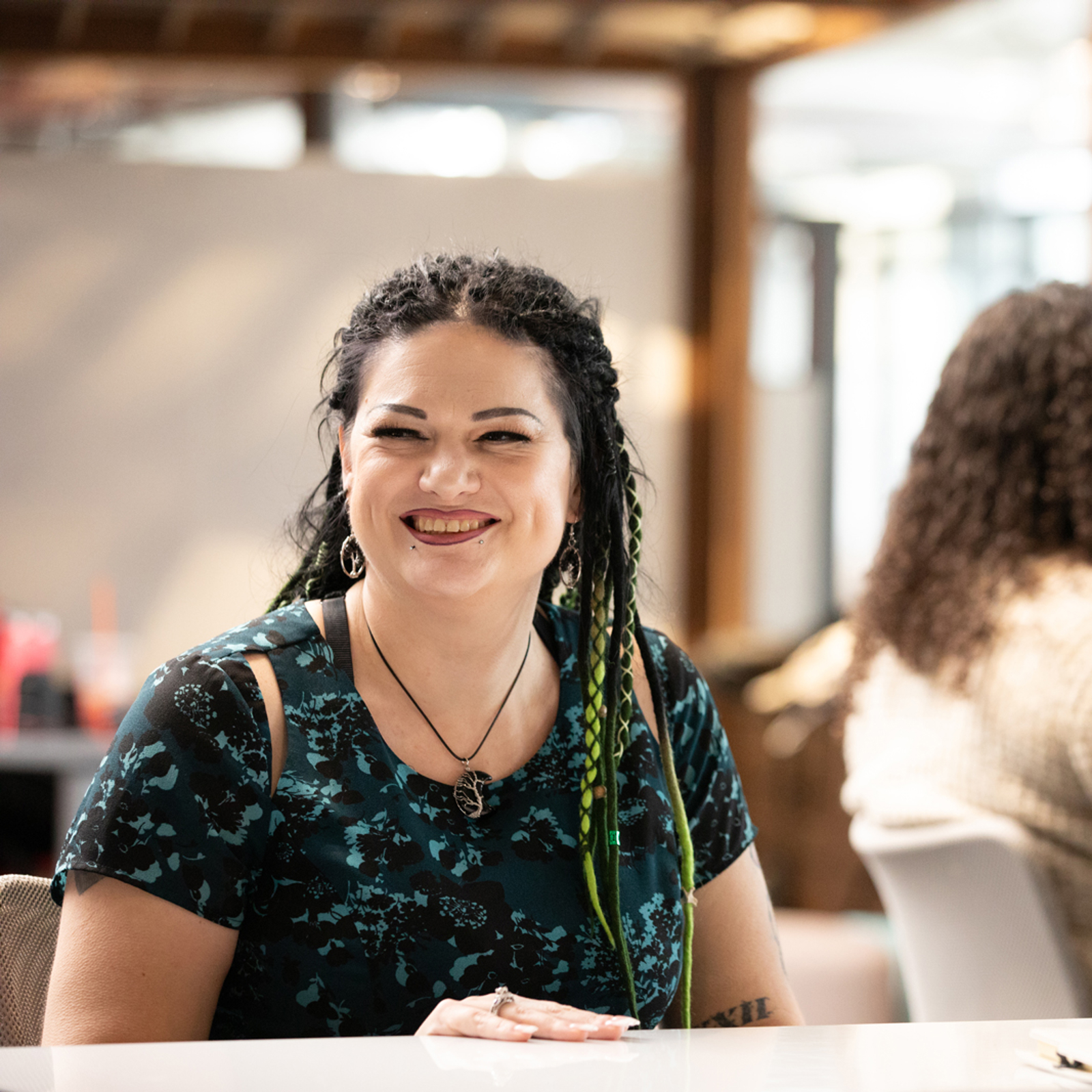 a woman smiling at camera