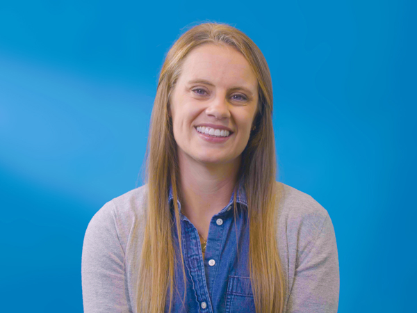 a woman smiling at camera